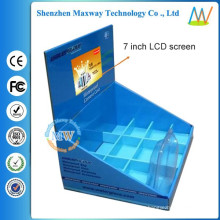 corrugated display with 7 inch LCD screen on top